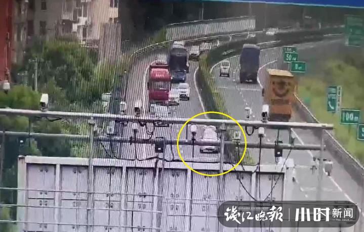  超车|没有报警，没有放警示牌，车子爆胎后，他竟然在高速超车道上换轮胎