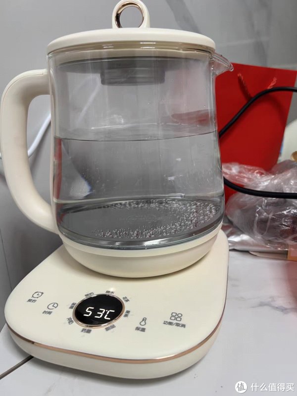 小熊养生壶煮茶怎么使用(小熊养生壶：创新多功能玻璃煮茶器，办公室的最佳选择)