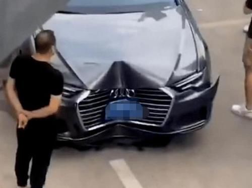  做法|男子开奥迪车被撞，转身给媳妇“报喜”，网友为他做法点赞